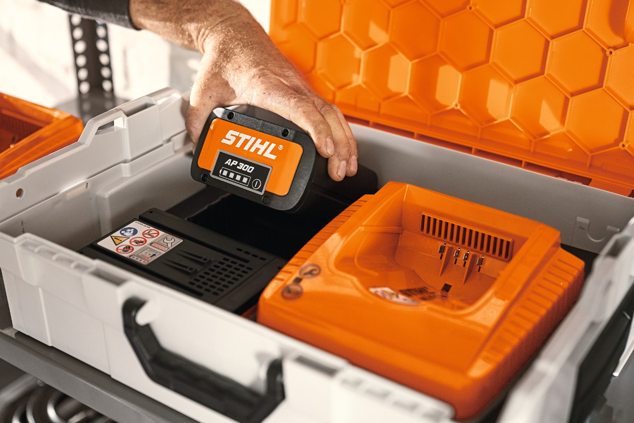 STIHL battery box with AP 300 lithium-ion battery and charger
