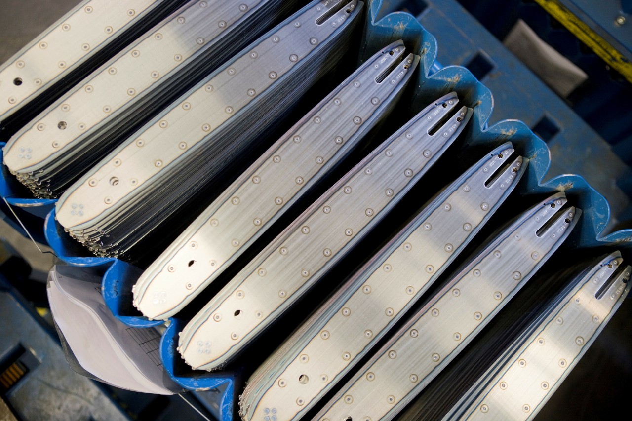 STIHL guide bars stacked in a box
